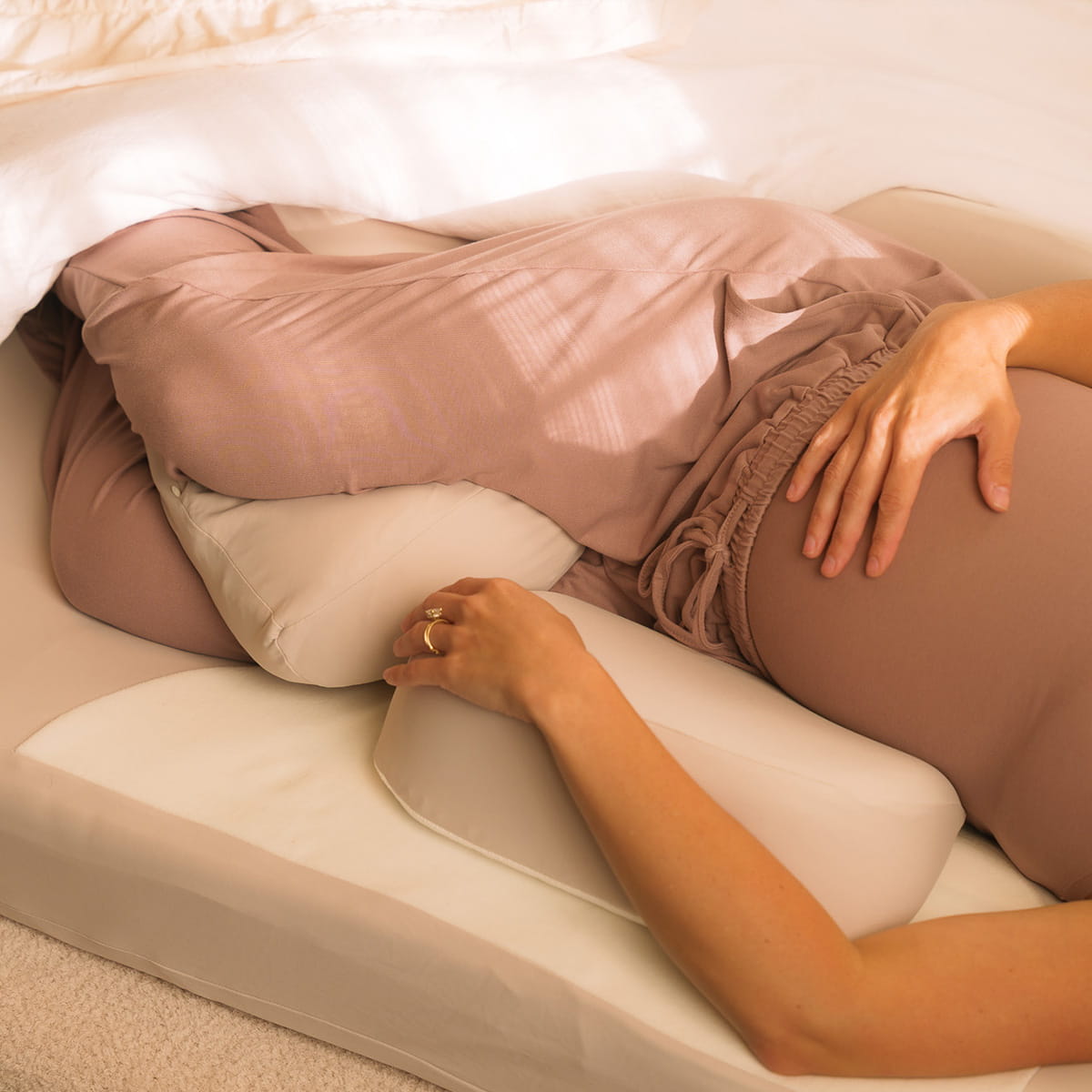 A example of using the Resting Roo Maternity Sleep System, focusing on the wedges and knee pillow